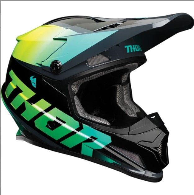 black motocross style helmet with green and teal accents