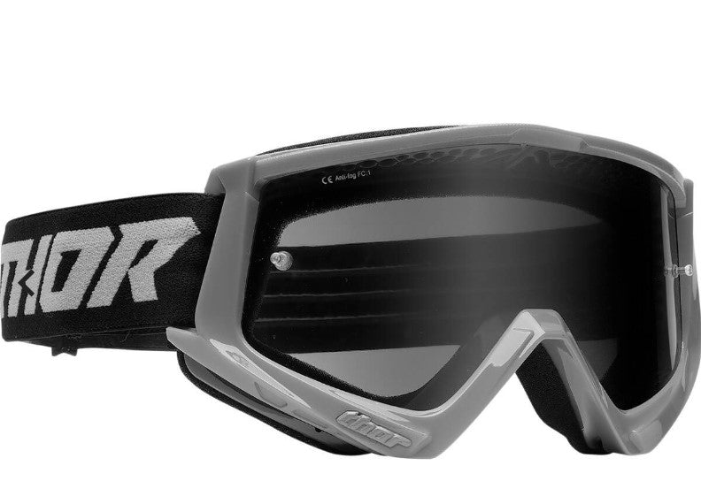 grey thor goggles, tinted lens, black strap, white logo